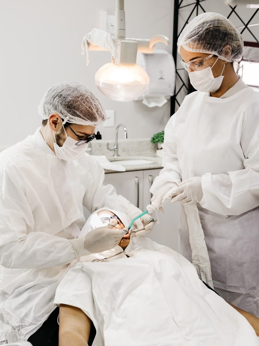Dentist preparing sterilised instruments